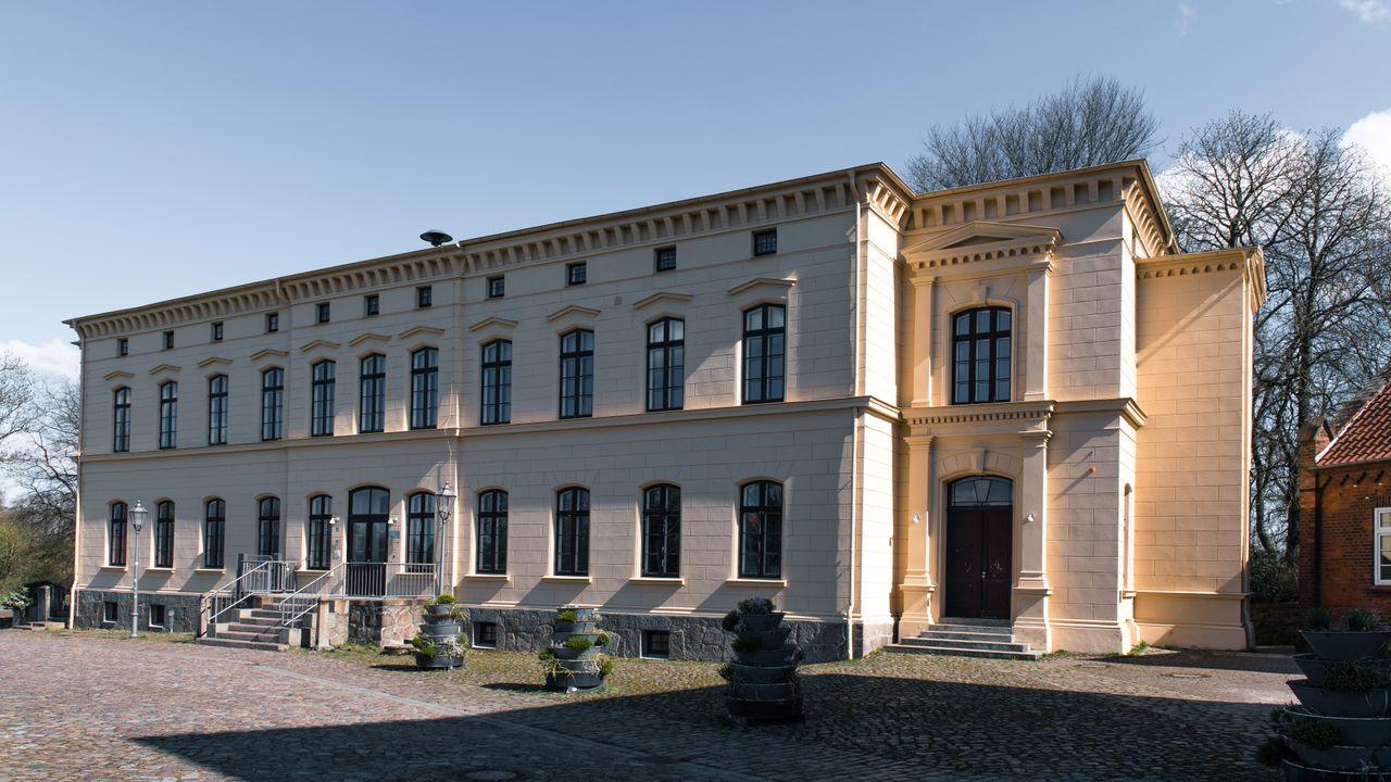Exterior view of a historic building in Wittenburg, Germany on a sunny day.